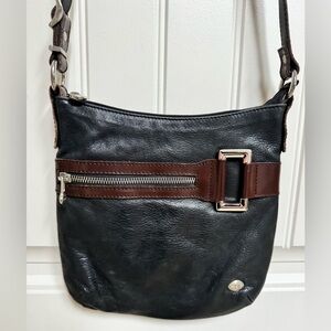 The Trend Black with Brown Trim Leather Buckle Detail Crossbody Bag. 9.5x9.5x0.5